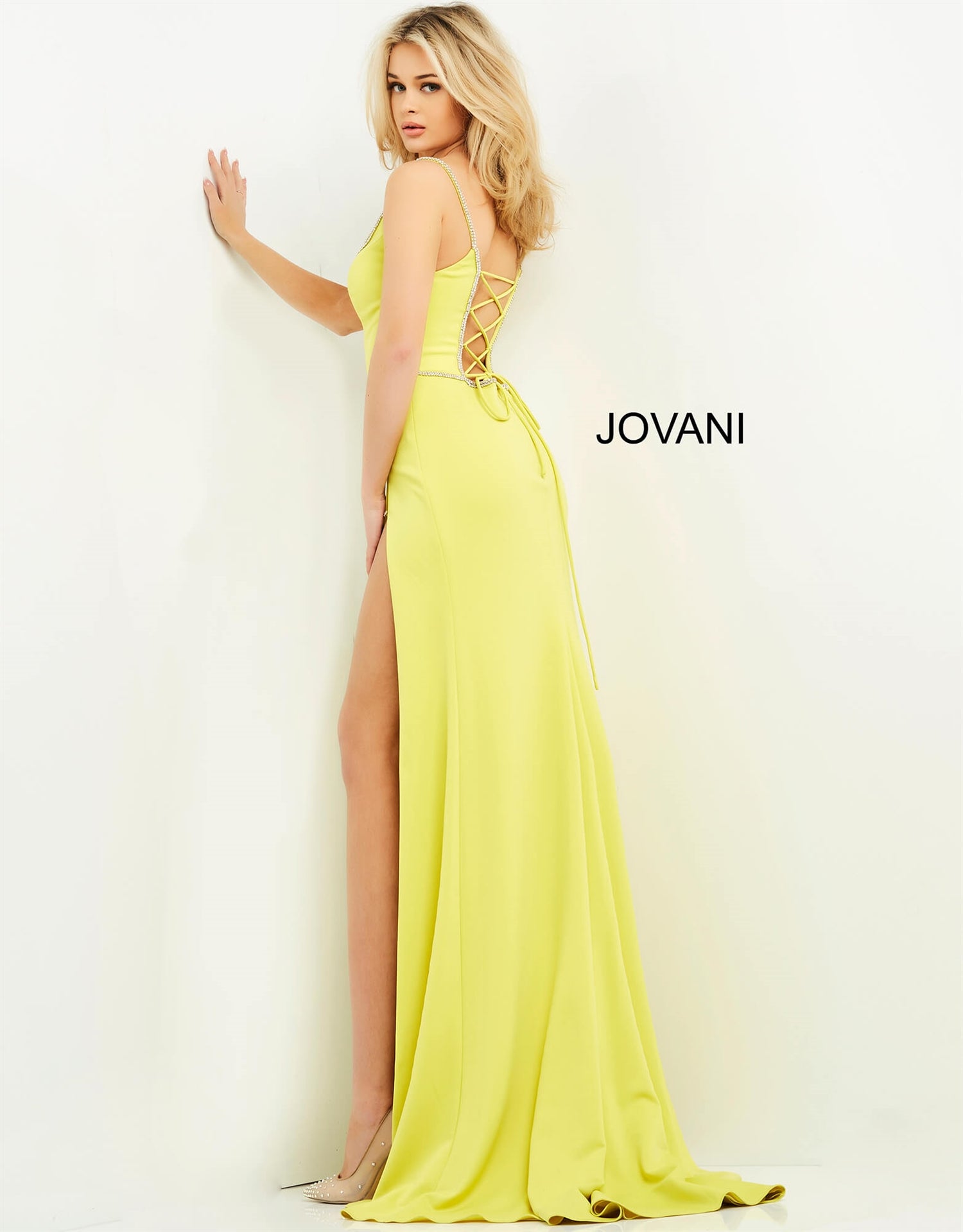 Jovani 06557 Rhinestone Trim Strap-back High Slit Dress